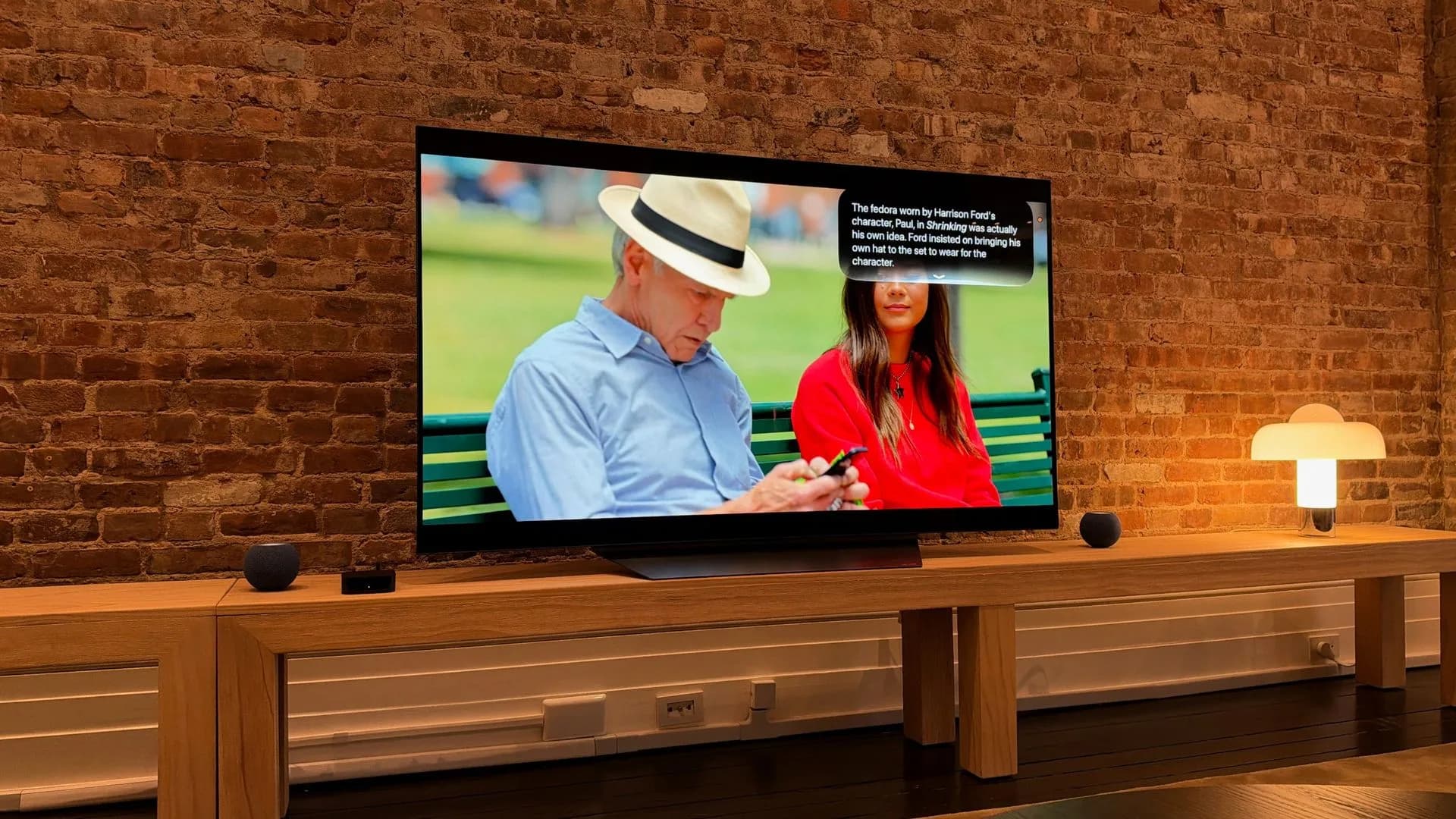 Apple TV 4K streaming box alongside the redesigned Siri Remote with UWB chip