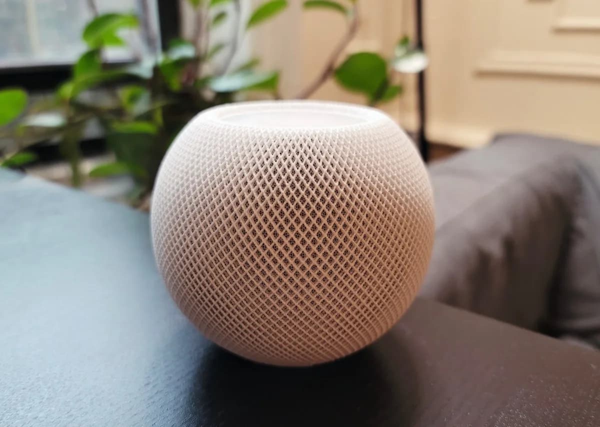Rendering concept of an Apple smart home hub with a square display sitting on a kitchen countertop