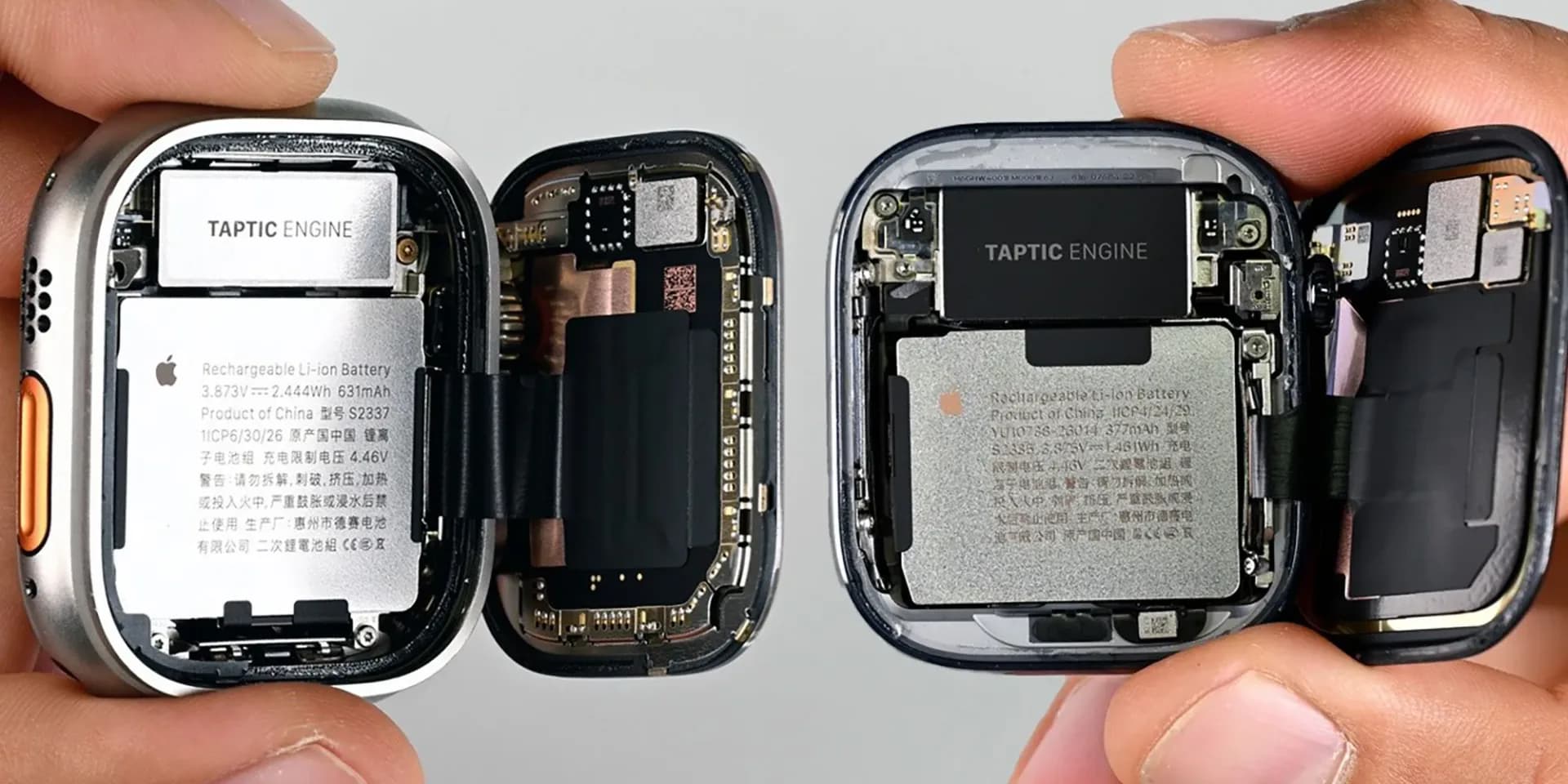 iFixit technician prying open the display of an Apple Watch during a teardown