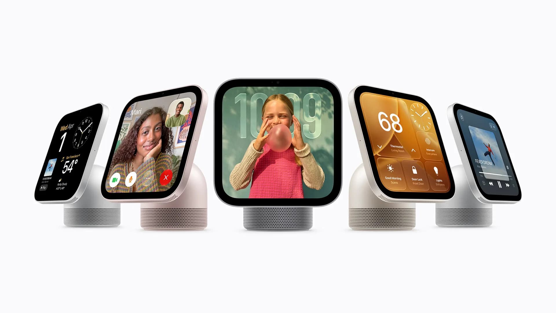 Apple HomeView smart display mounted on wall beside a door, showing a clock and weather widget
