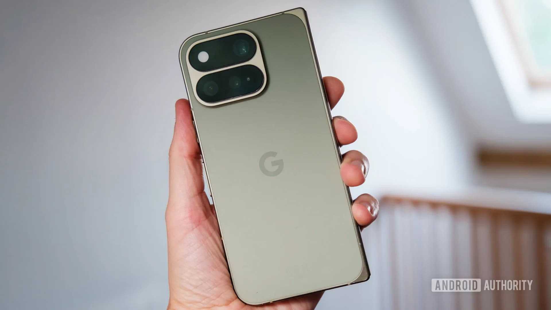 Google Pixel 11 Pro Fold foldable phone shown partially open on a surface