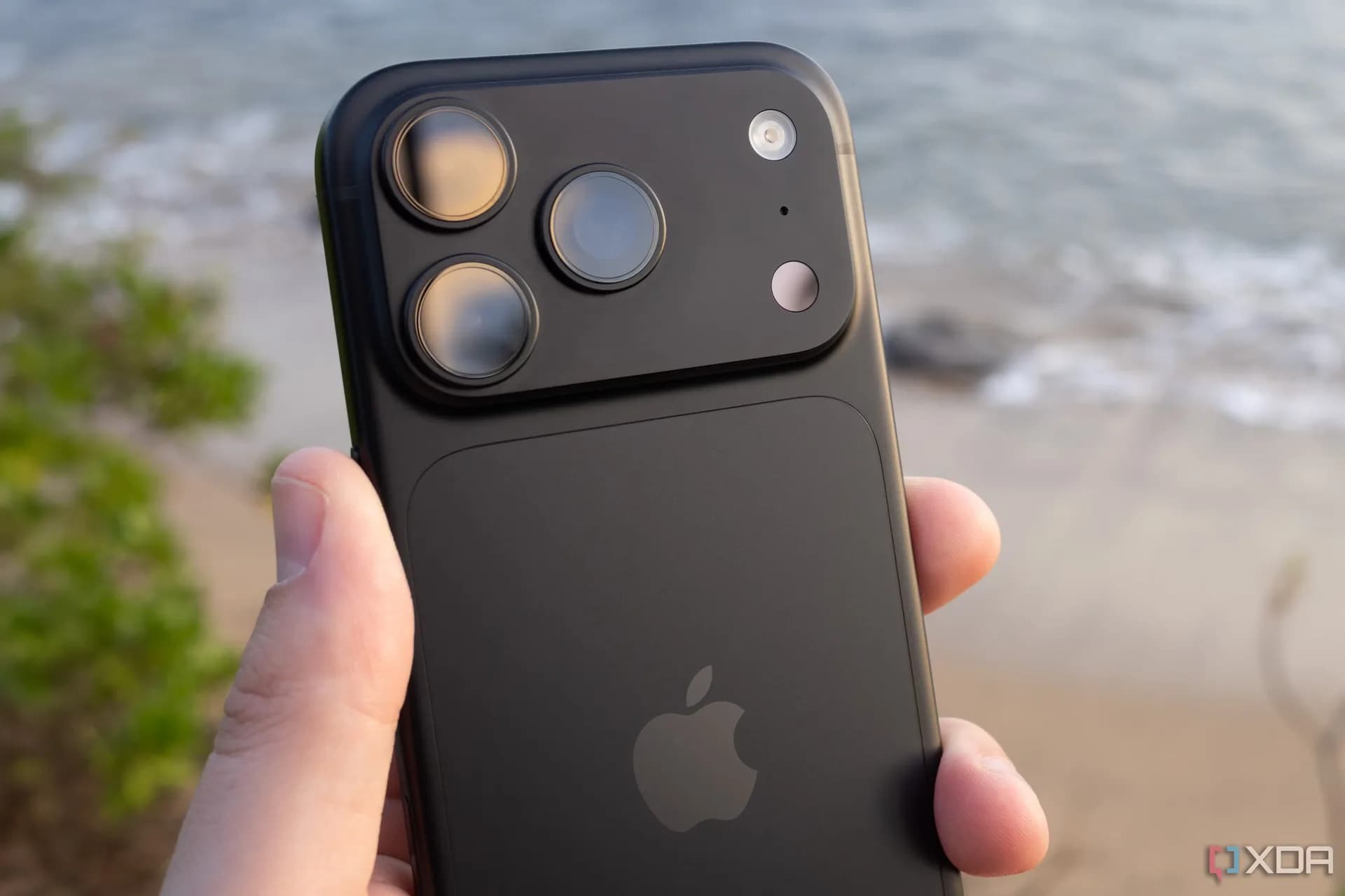 iPhone 18 Pro in Burgundy, front and rear views showing unchanged design language versus iPhone 17 Pro
