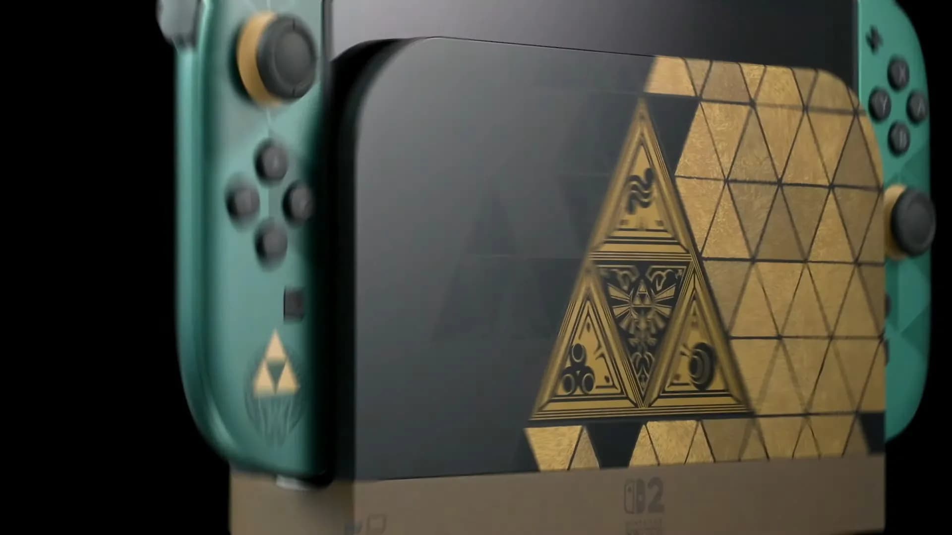 Nintendo Switch 2 console in black, gold and green Legend of Zelda 40th Anniversary Edition styling with Triforce decals.