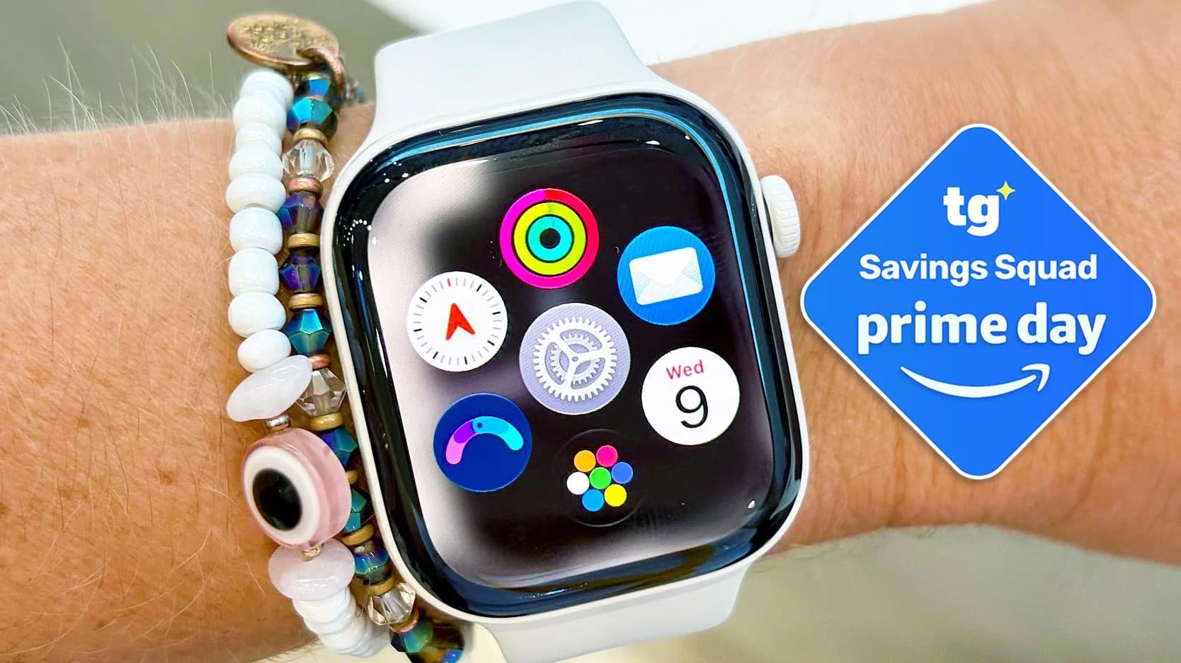 Apple Watch Series 12 on wrist, showing black face with white complications
