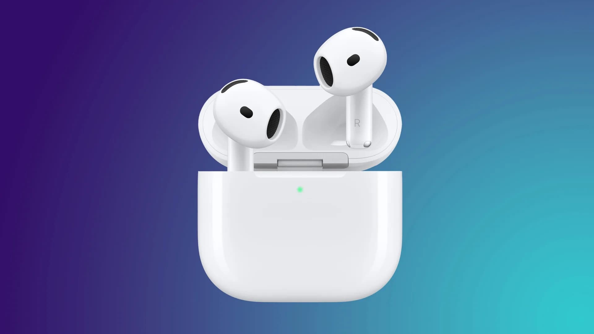 Apple AirPods 5 earbuds resting next to their charging case on a flat surface