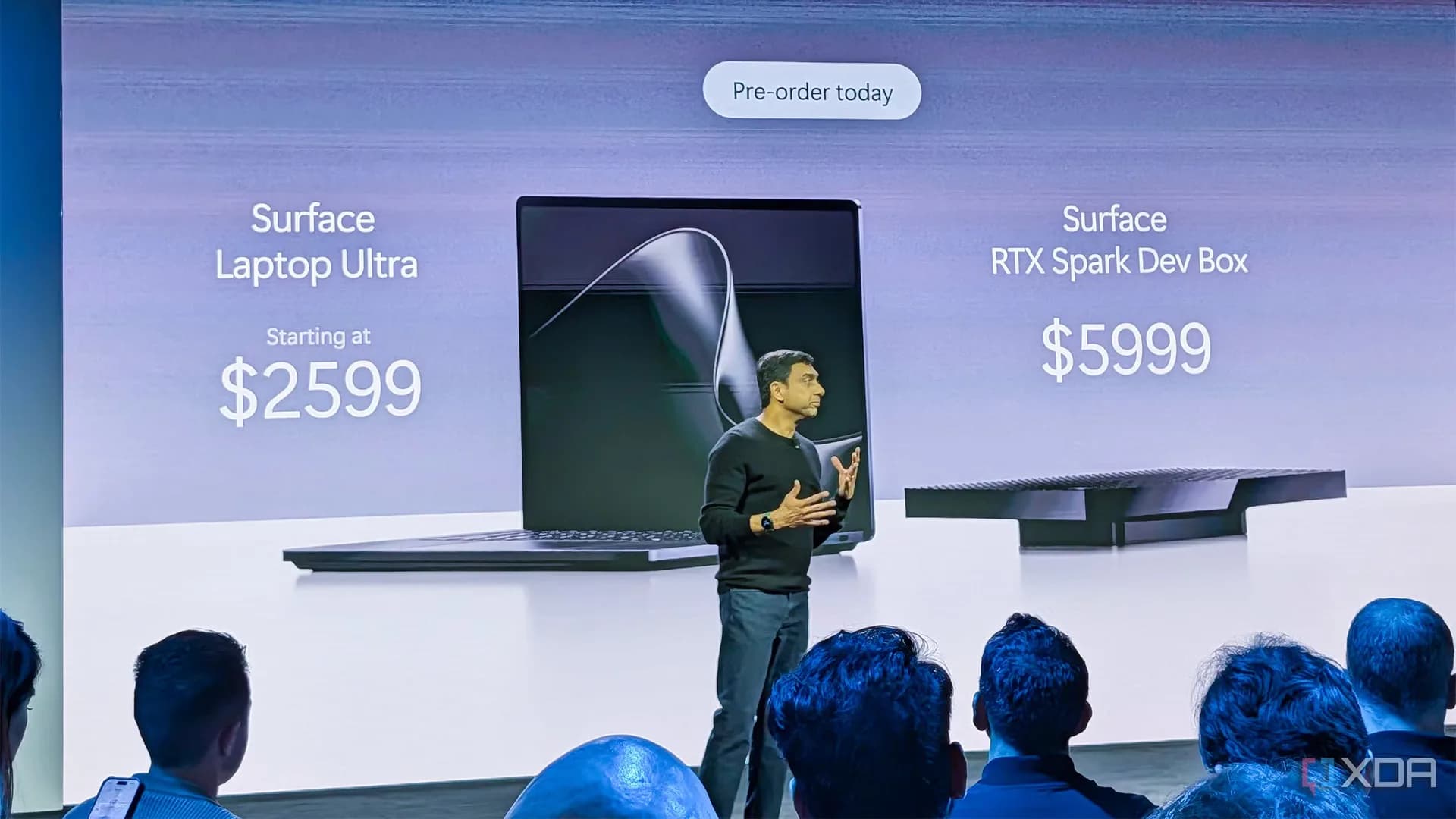 Microsoft Surface Laptop Ultra open on a desk showing the keyboard and mini-LED display