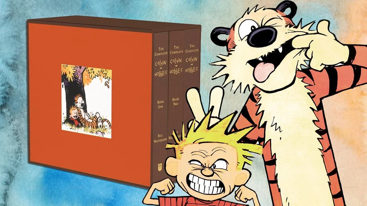 A photo of the Calvin and Hobbes hardcover box set in its slipcase, next to the four paperback volumes stacked beside it.