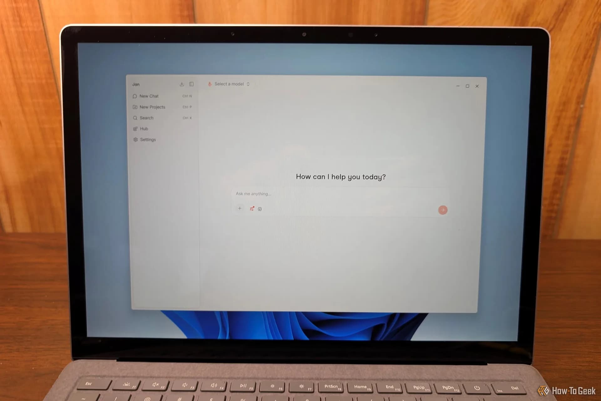 A laptop screen showing source code next to an AI chat assistant window reviewing it for security issues