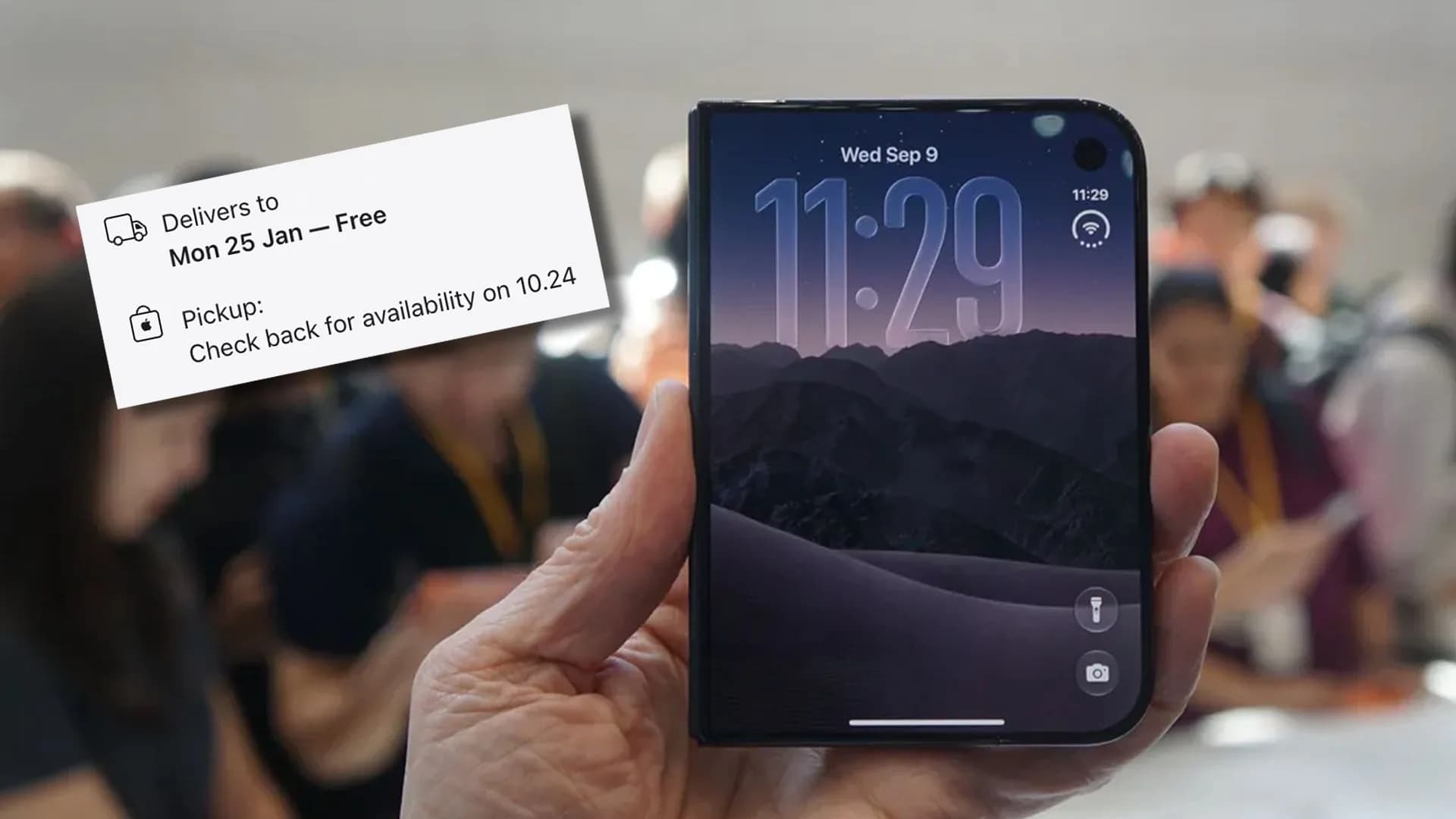 Close-up view of Apple's folding smartphone hinge mechanism on a display surface