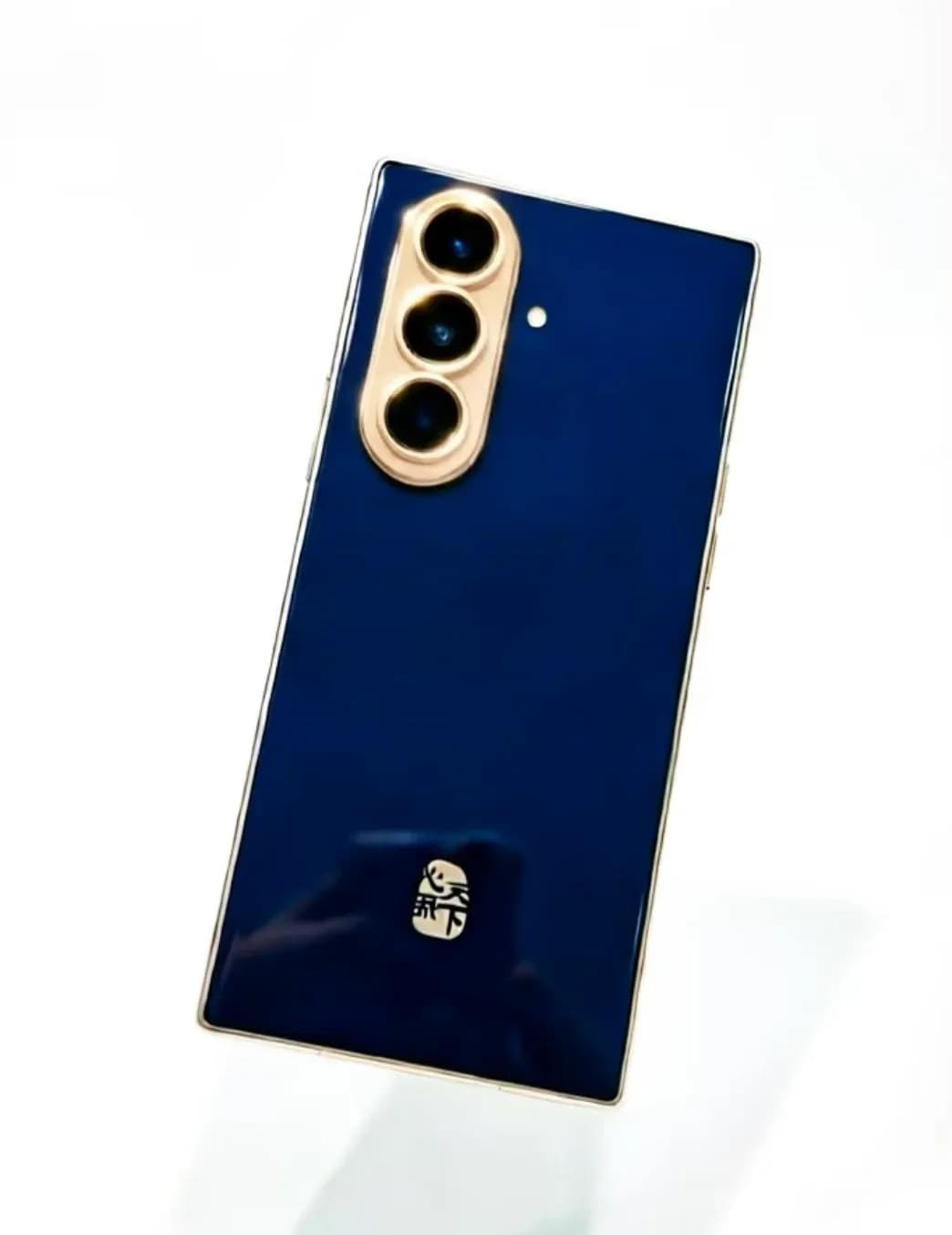 Leaked image allegedly showing the Samsung W27 foldable phone in blue with gold trim and a gold camera island.