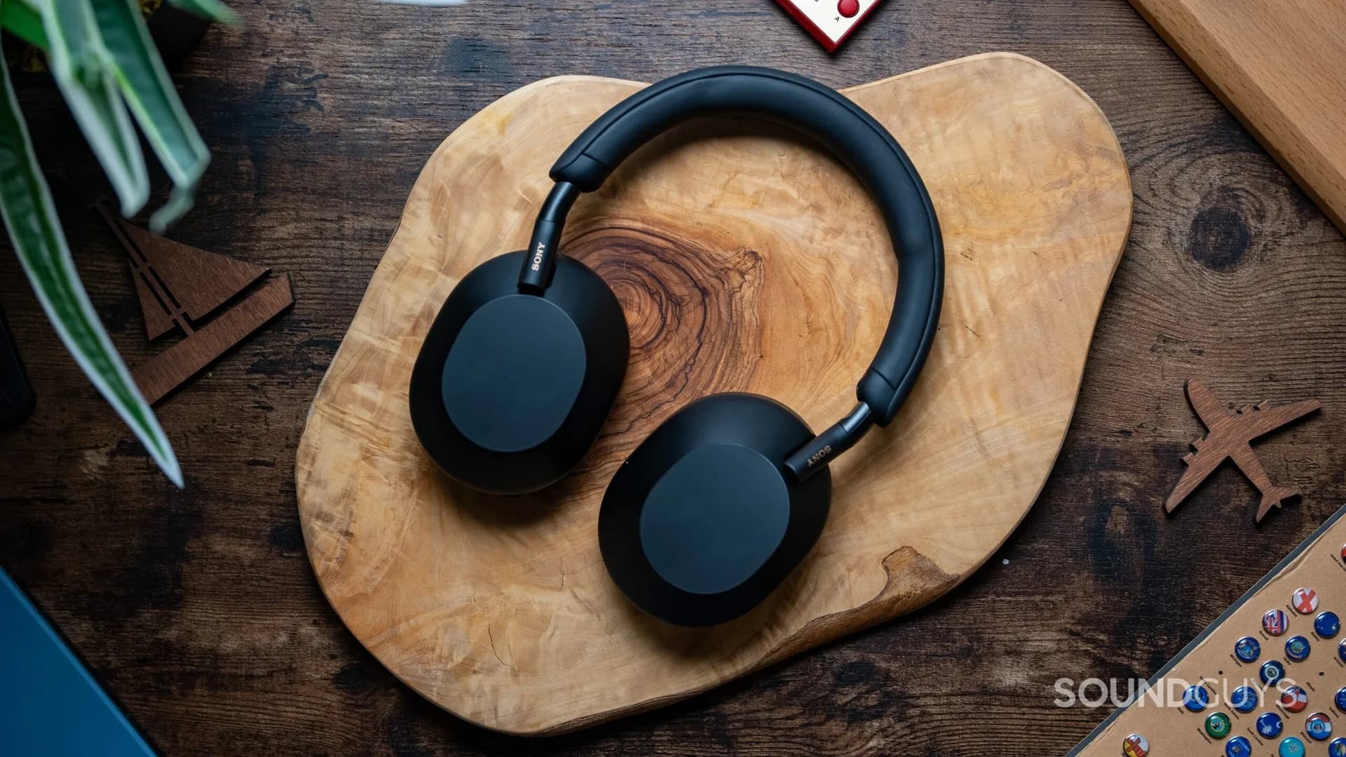 Sony WH-1000XM5 wireless noise canceling headphones shown in black on a neutral background.