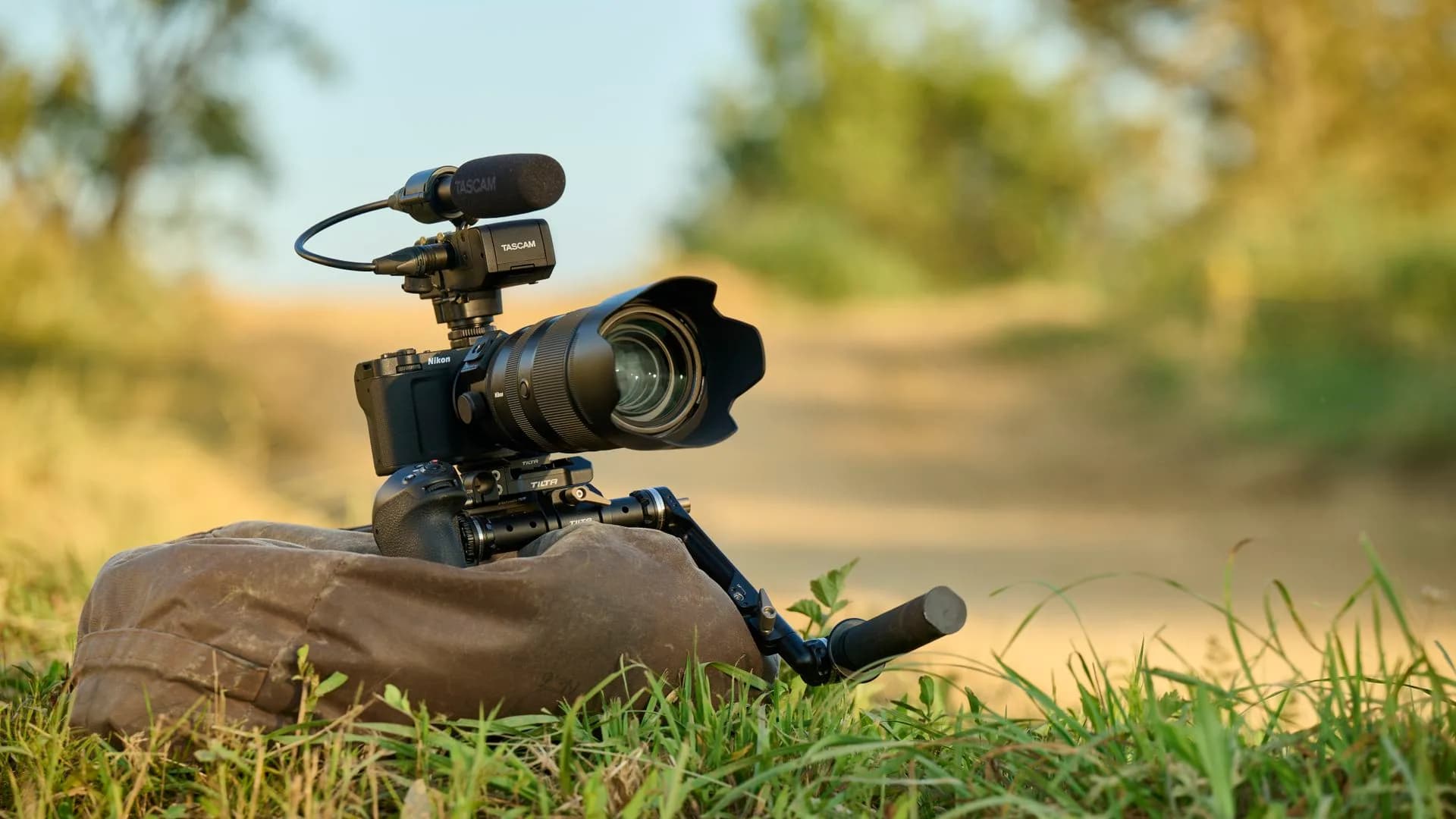 Compact cinema camera mounted without an electronic viewfinder on a video rig