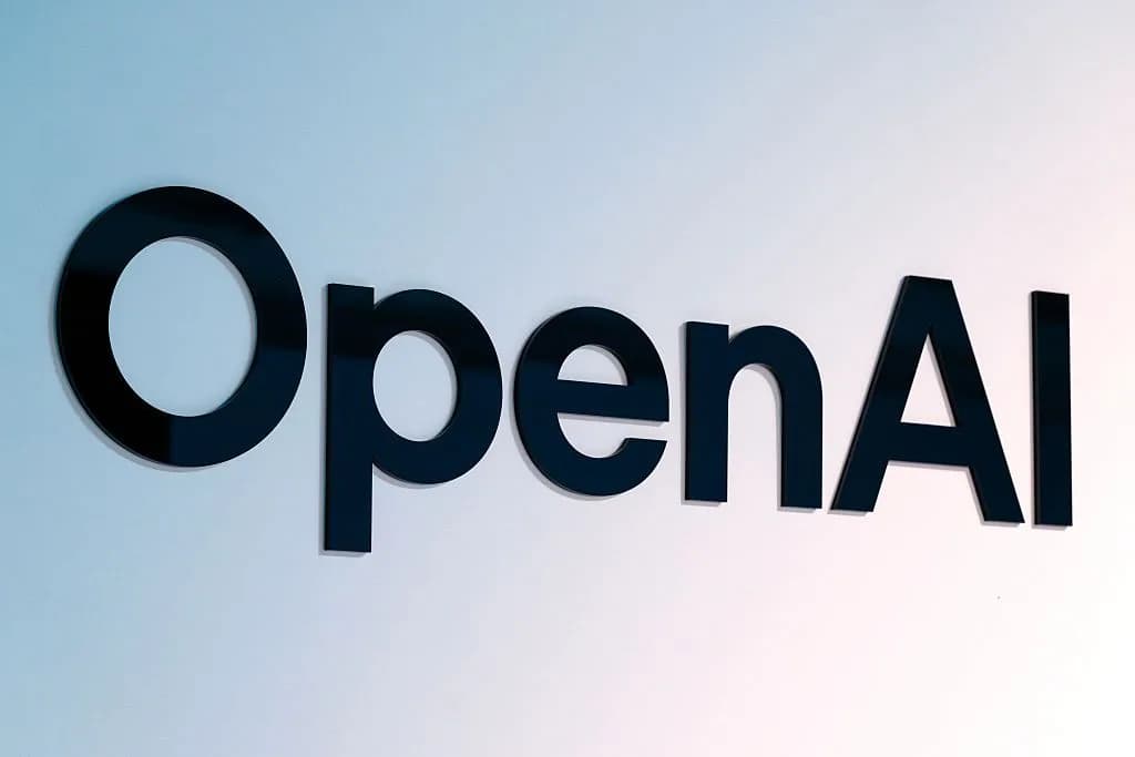 OpenAI and Apple logos displayed against a dark background