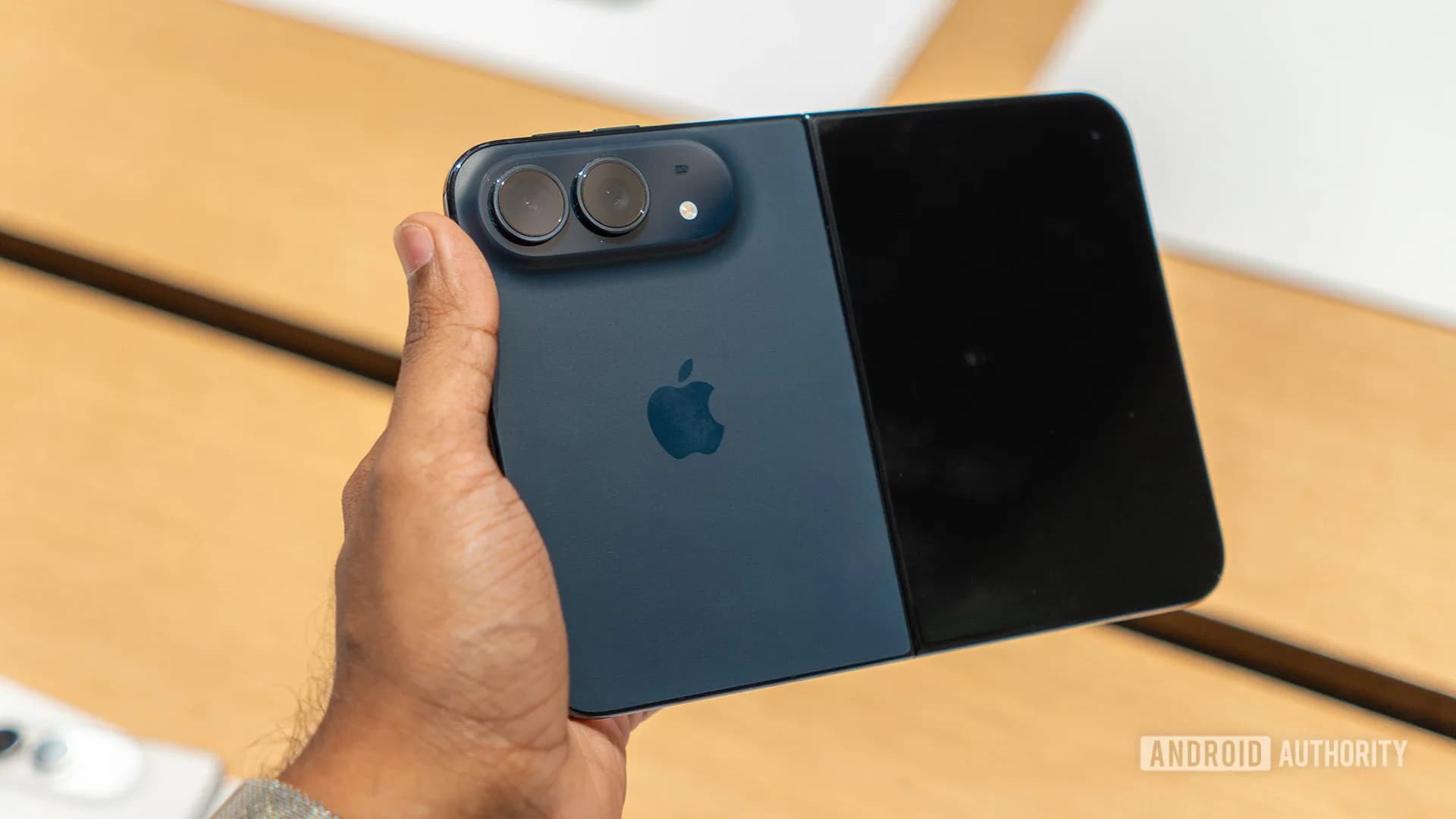 Apple iPhone Duo folded and unfolded, front-facing camera visible on both screens