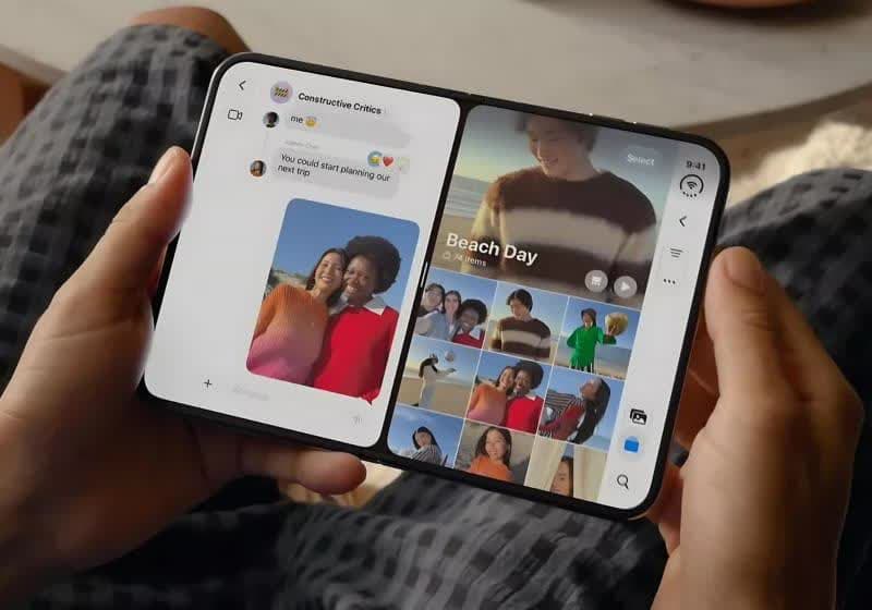 Apple iPhone Duo foldable phone shown partially open, displaying its crease-free inner screen.