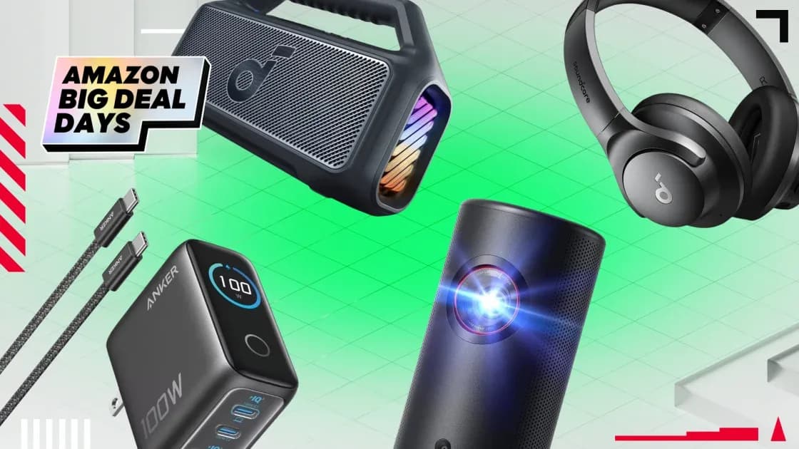 Anker Soundcore wireless headphones resting beside a portable outdoor speaker