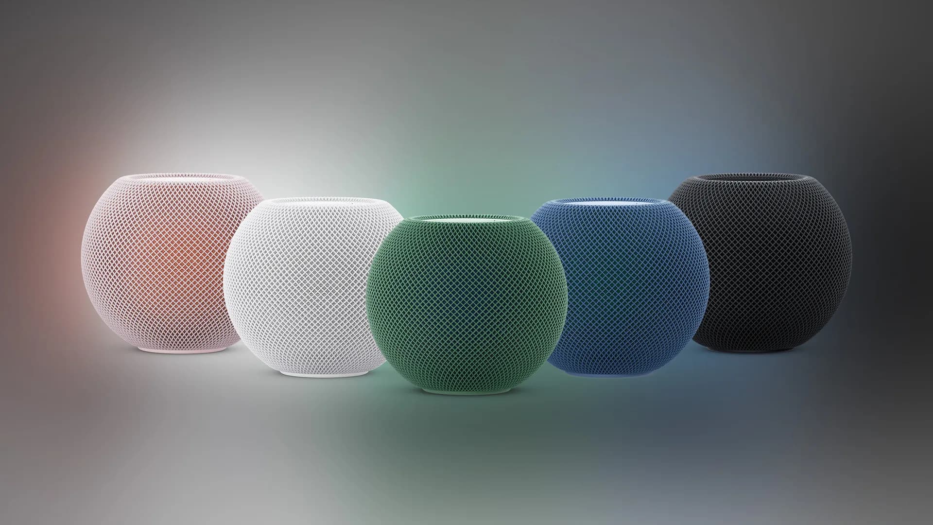 Apple HomePod mini 2 render showing pink and green variants beside original white unit