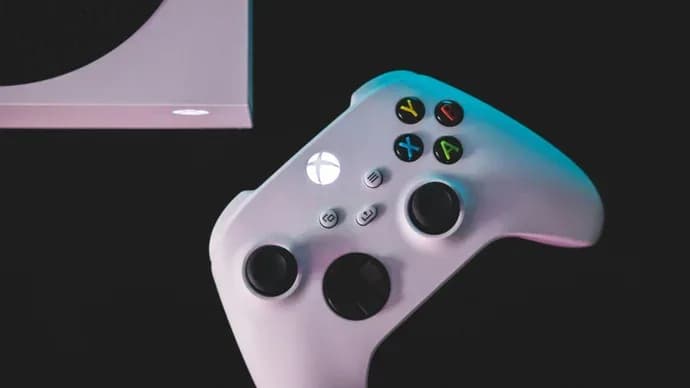 Xbox cloud gaming interface shown on a screen with a controller in the foreground