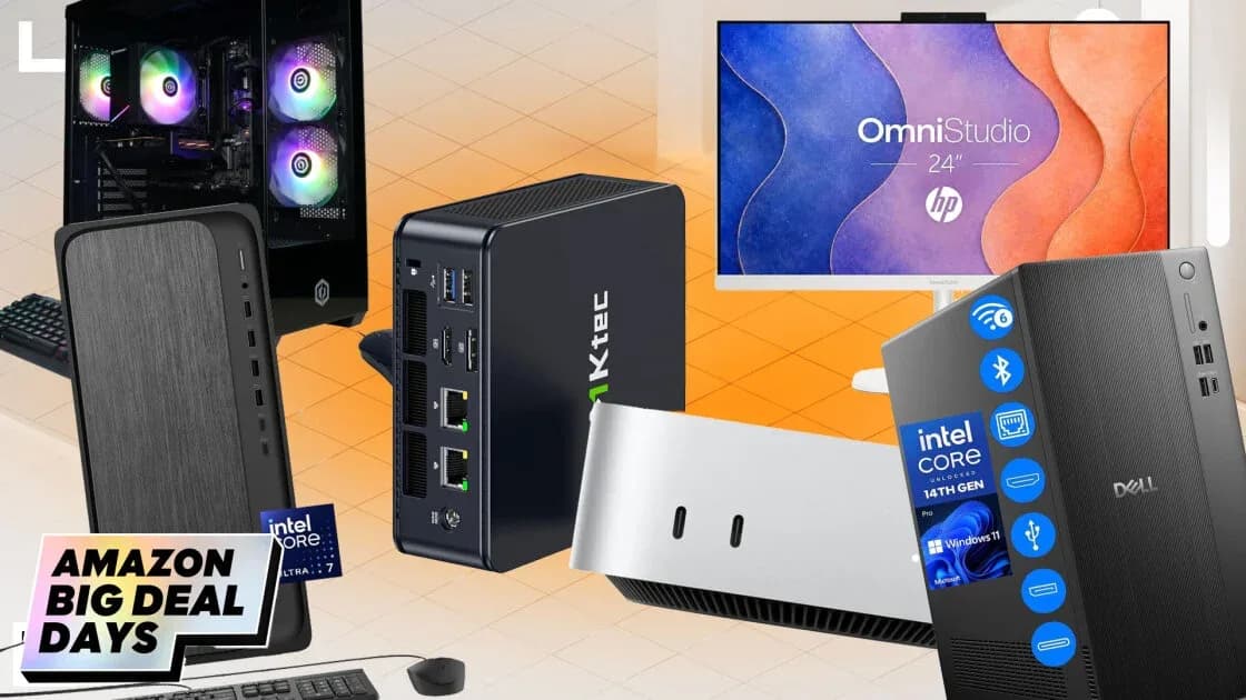 A row of desktop PC towers and an all-in-one computer on display during a retail sale event