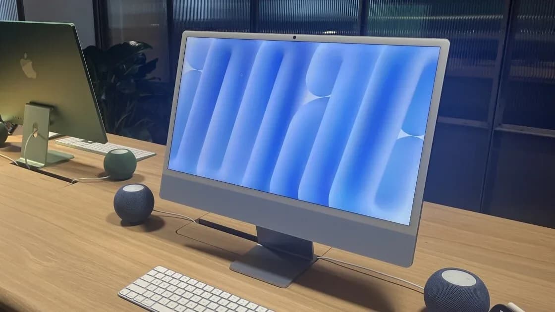 Apple's 2026 iMac all-in-one desktop computer shown in one of its available colors on a desk.