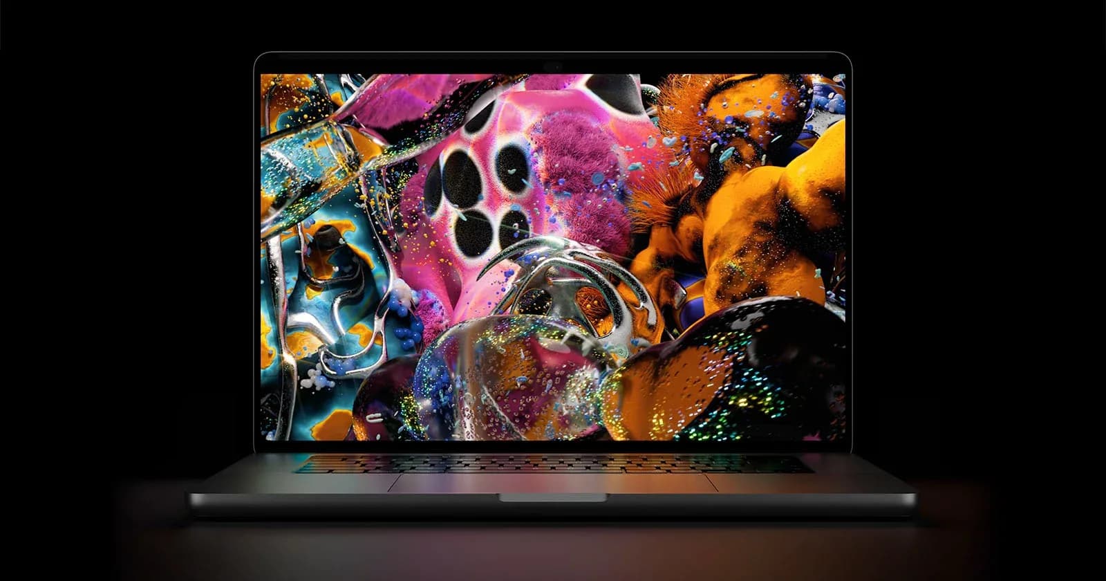 MacBook Pro with PROLED touchscreen display open on a desk