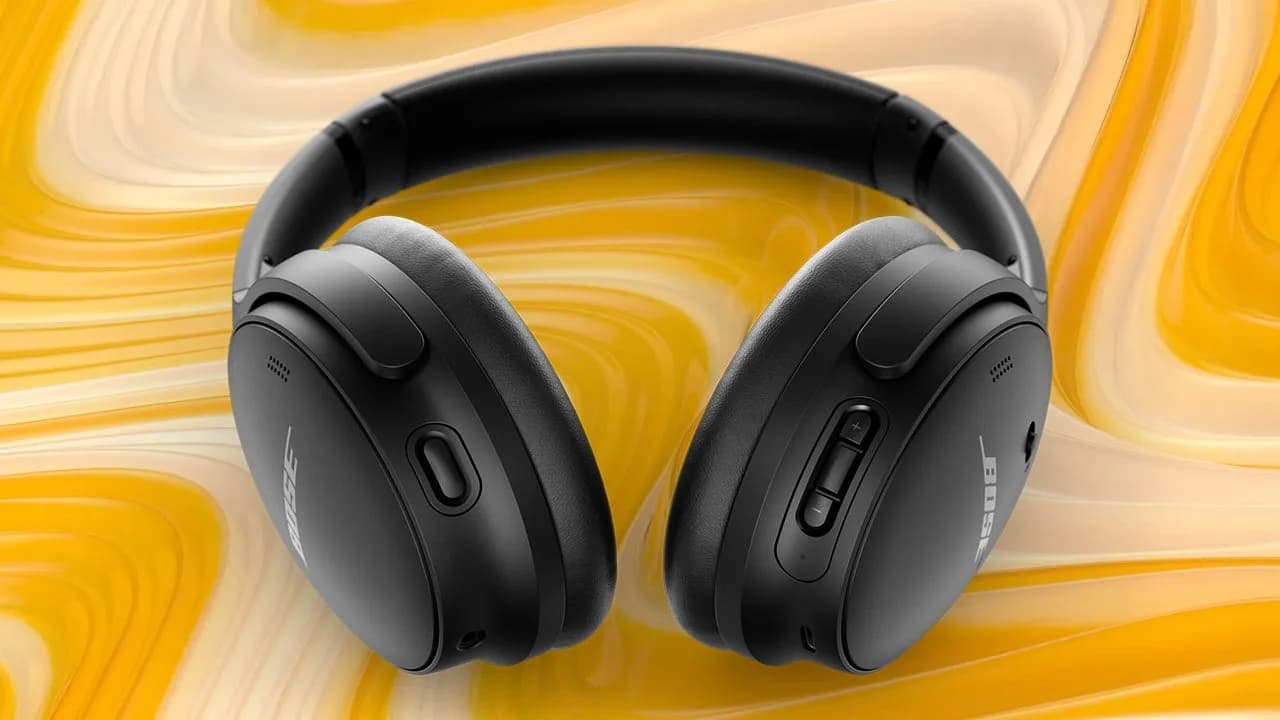 Bose QuietComfort noise canceling headphones resting on a flat surface