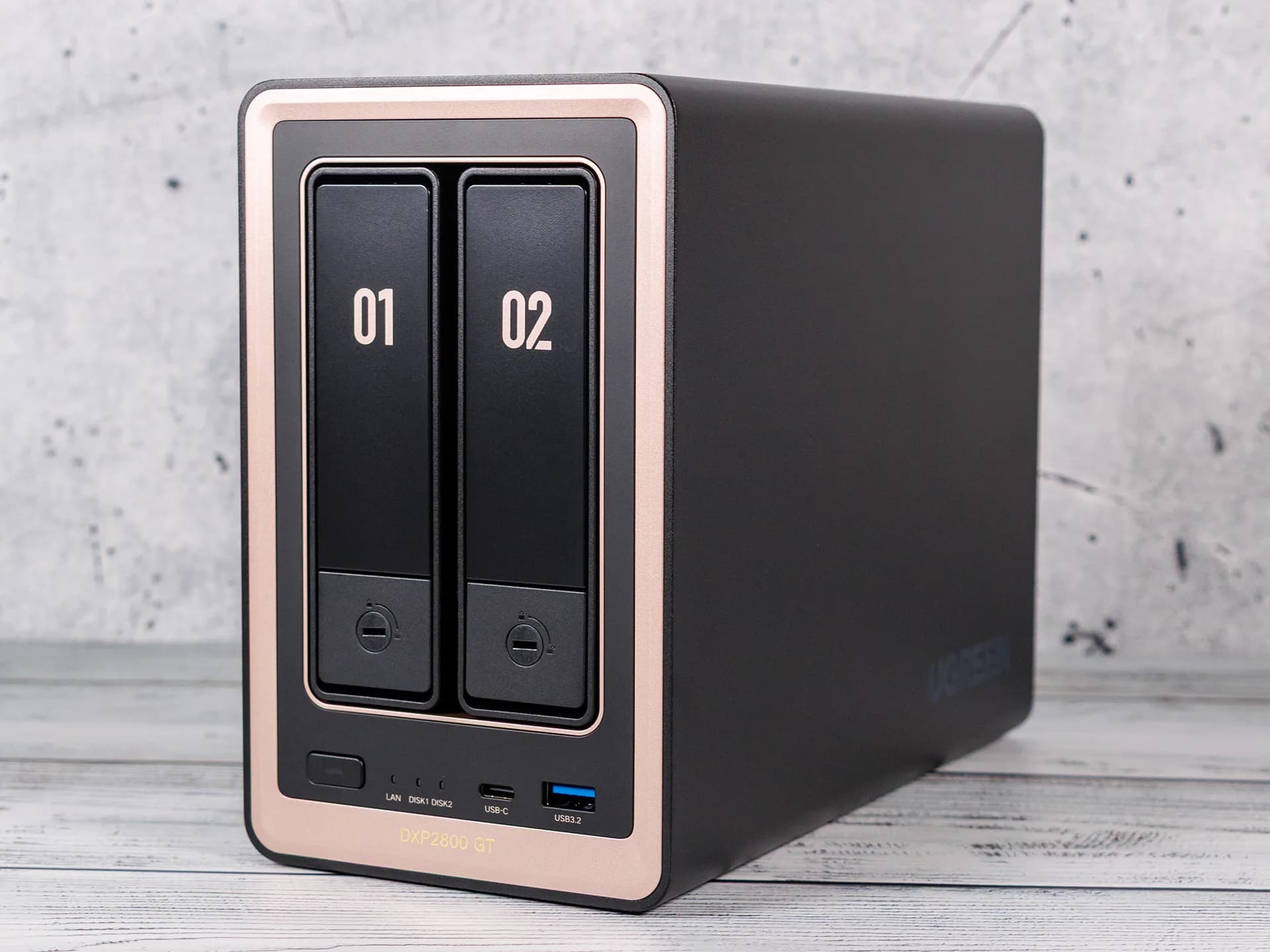 Ugreen NASync DXP2800 GT two-bay NAS enclosure standing on a desk