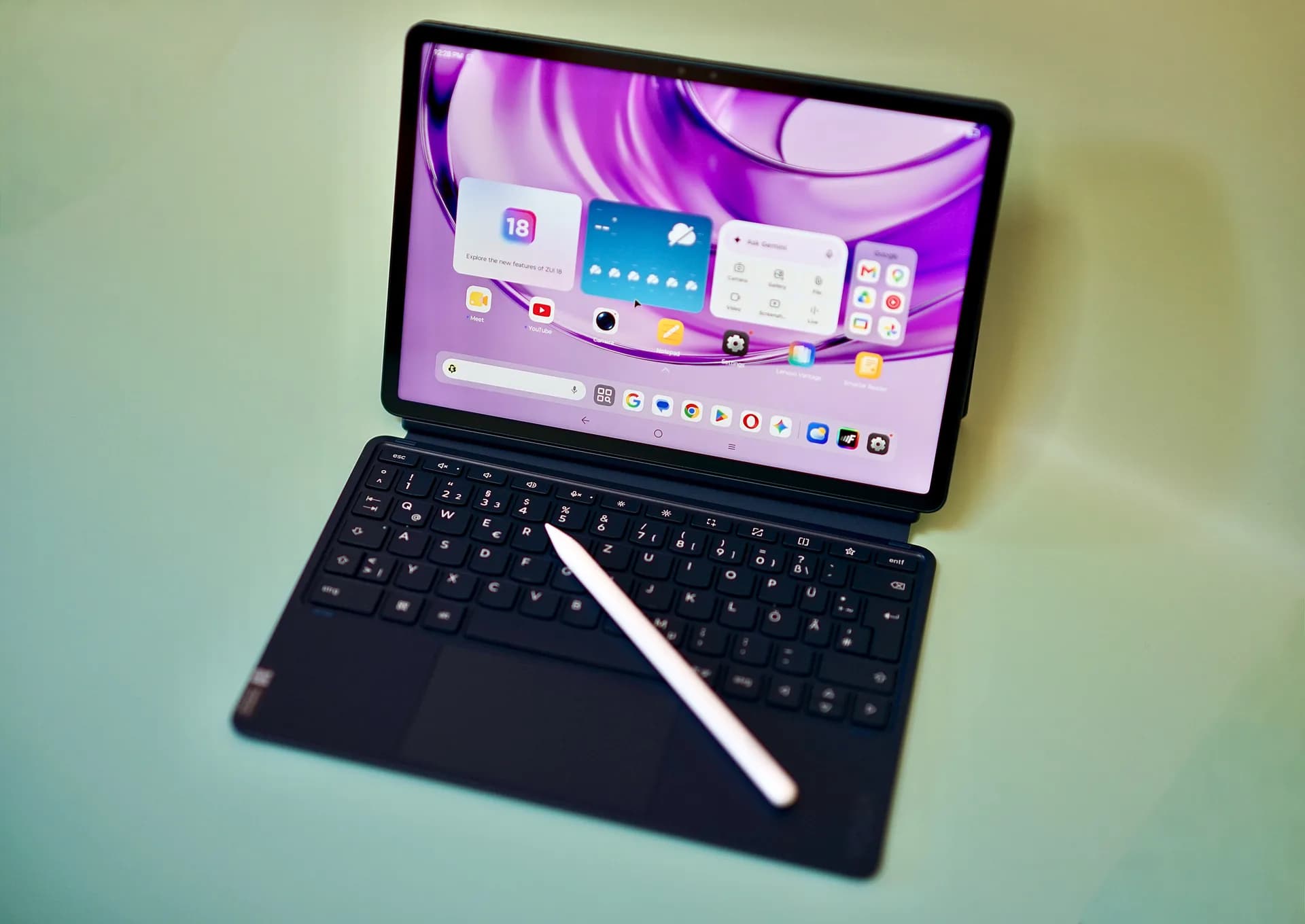 Lenovo Yoga Tab Gen 2 tablet shown with its included stylus and keyboard cover accessory