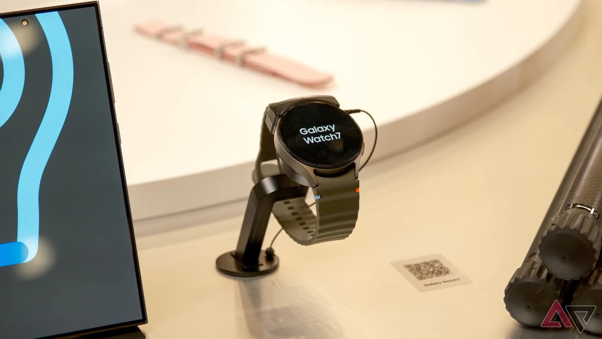Samsung Galaxy Watch 7 with a dark band displayed against a plain background