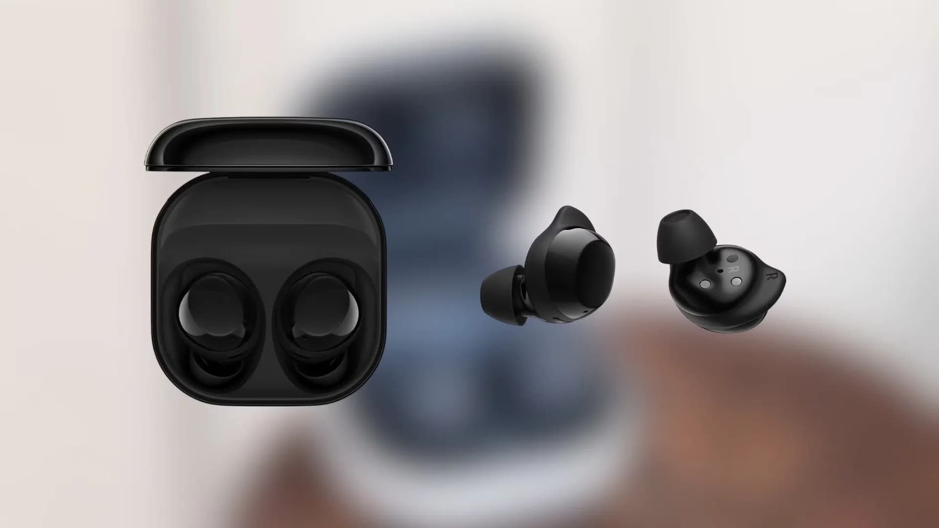 Pair of Samsung Galaxy Buds Core wireless earbuds inside open charging case