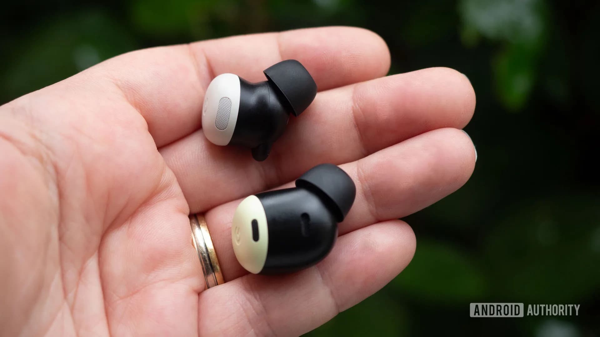 Google Pixel Buds Pro 2 earbuds and charging case on a surface