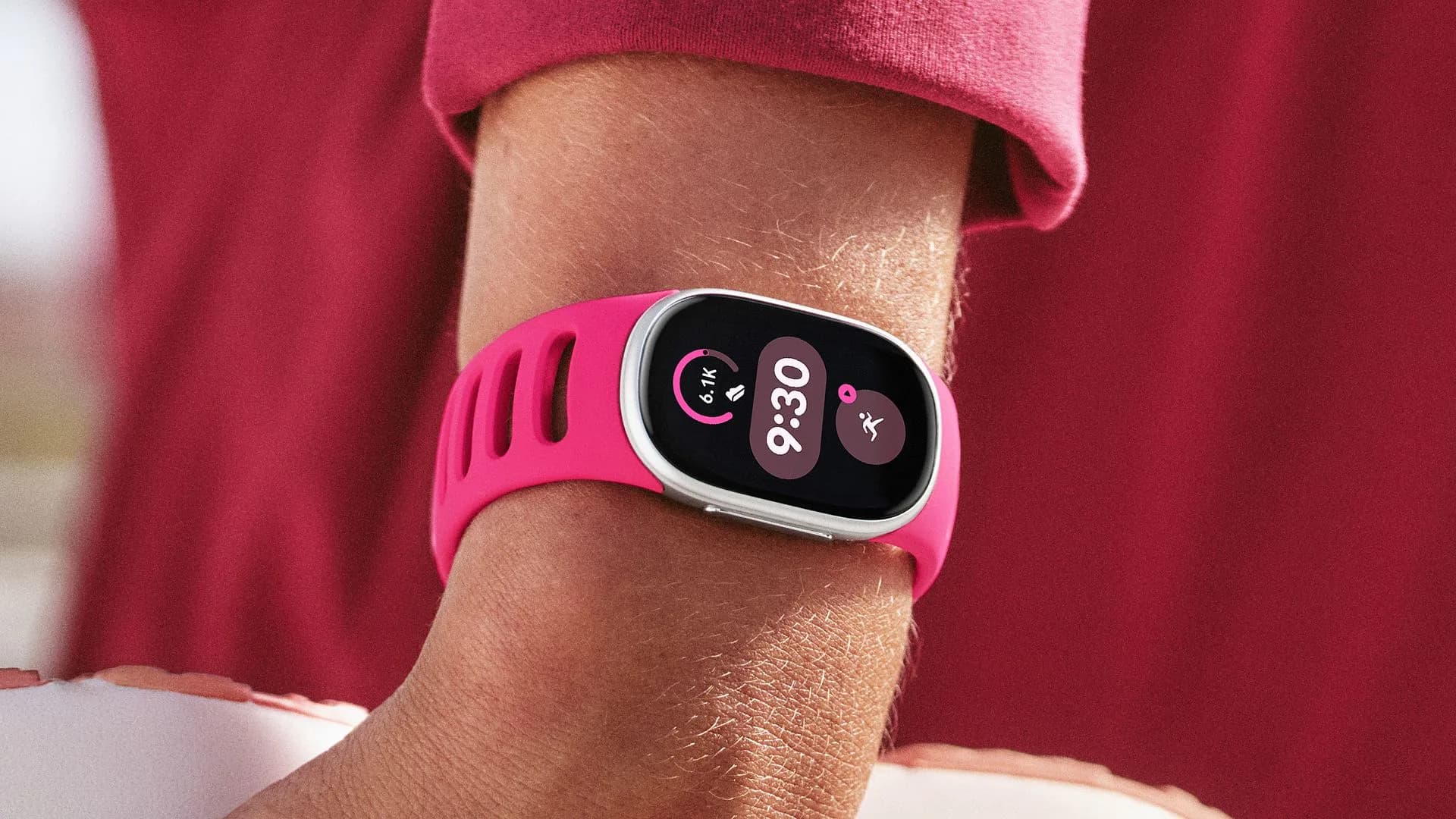 Fitbit Edge front view showing slim black band and circular AMOLED display