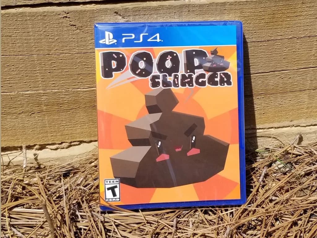 A PlayStation 5 console with a disc tray open, next to a stack of PS5 game cases