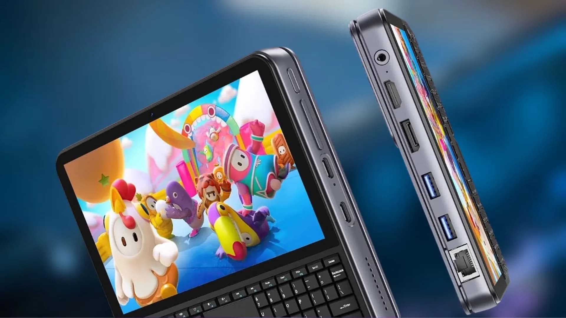 AE86 mini PC showing its 5.7-inch touchscreen, integrated keyboard, and compact chassis