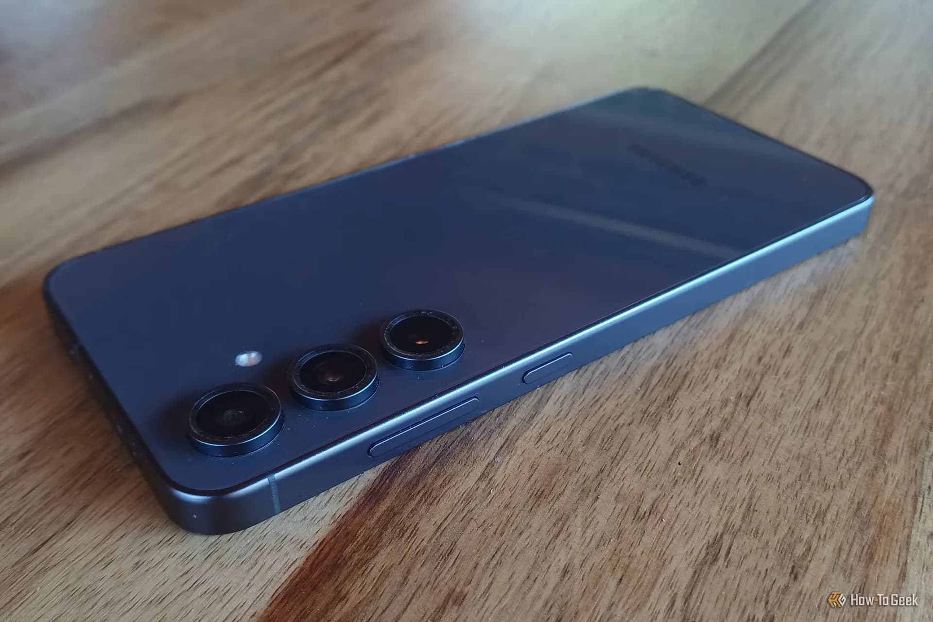 Close-up view of the side button and frame of a modern Samsung Galaxy smartphone.