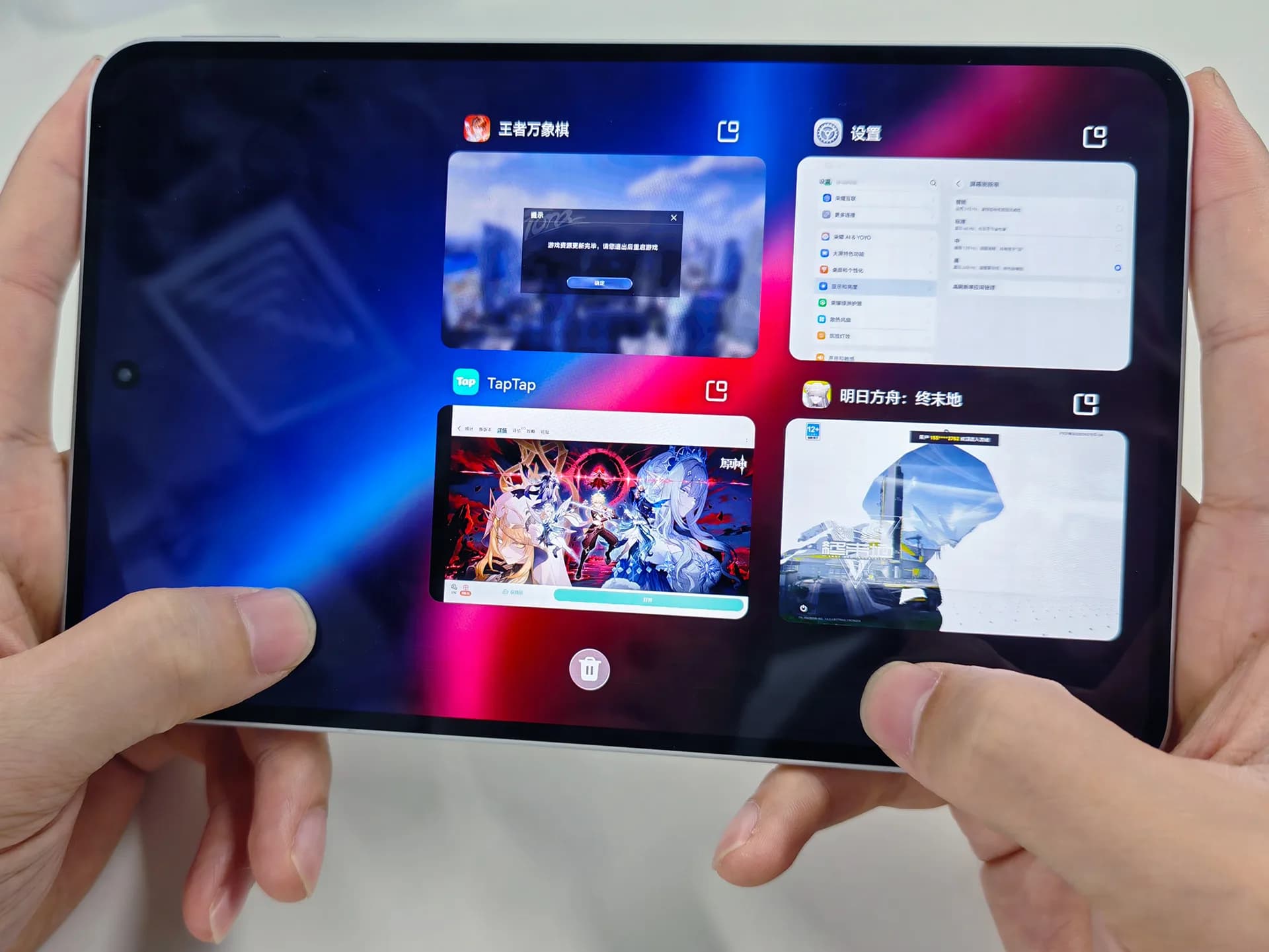 Front-facing teaser image of the Honor Win Pad tablet showing slim bezels and a centered front camera cutout, displayed on a white background.