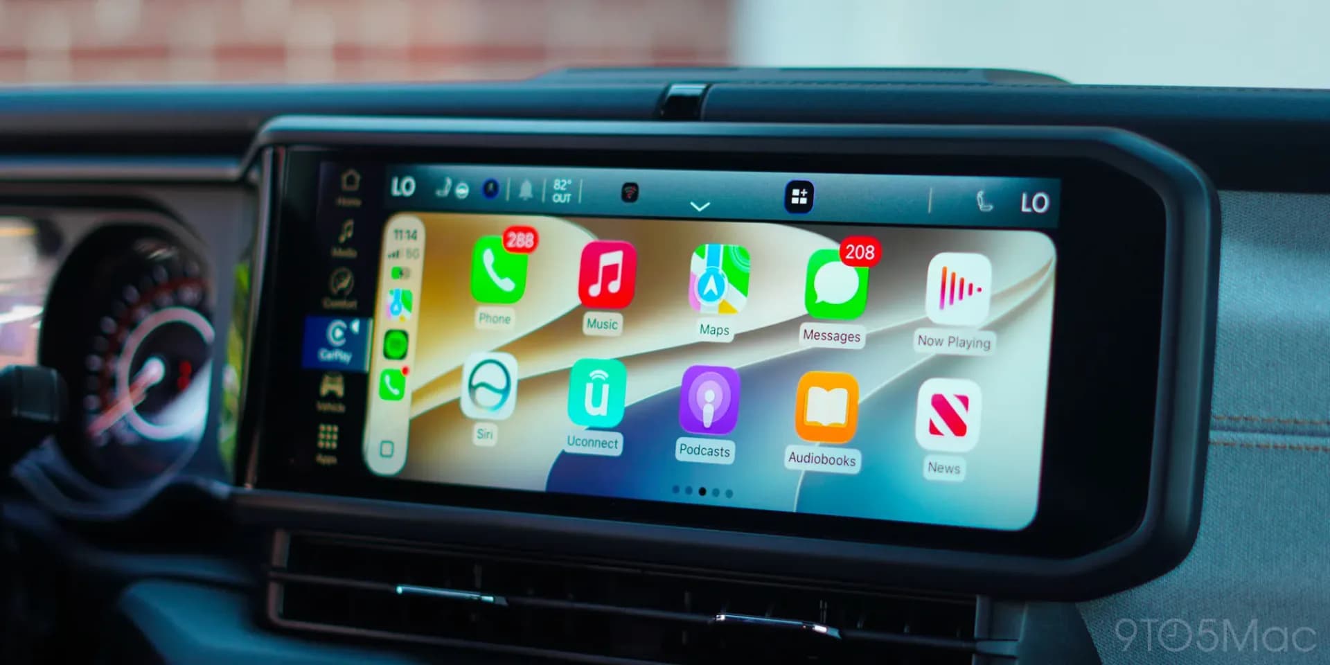 Apple CarPlay interface displayed on a vehicle dashboard screen running iOS 27.