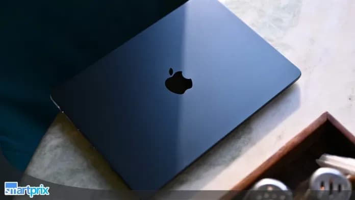 Apple logo on dark background with faint outline of a square display and laptop