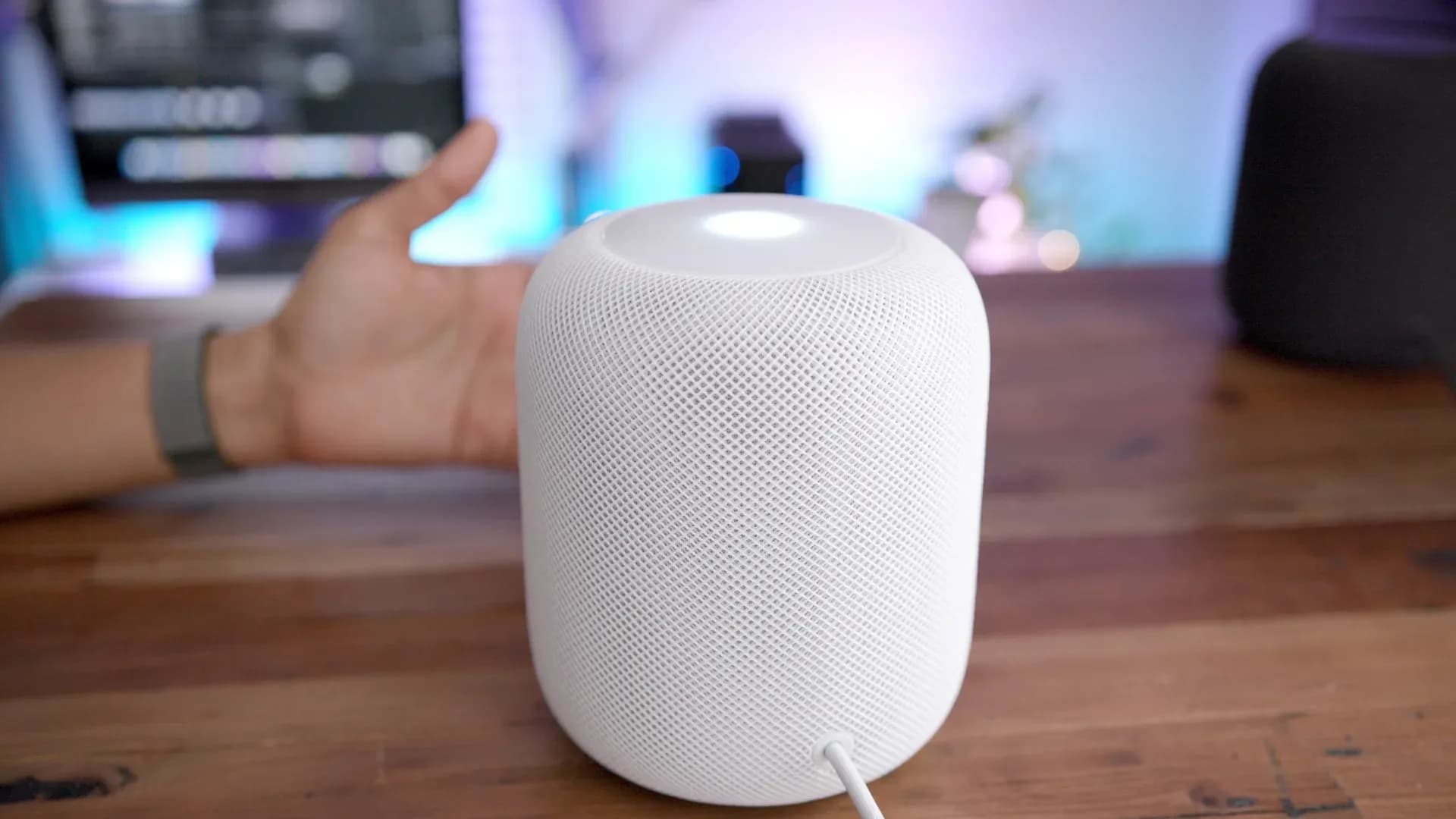 HomePod mini and HomePod (2nd gen) side by side, with iOS 27.2 Home app interface showing 'Lock Controls' toggle