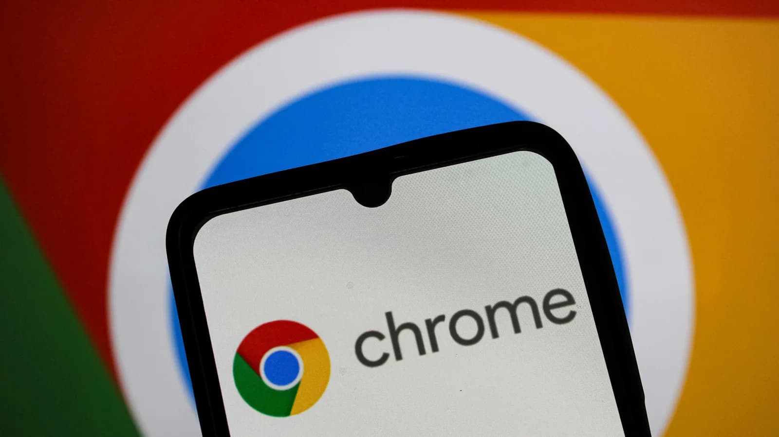 The Google Chrome logo displayed on a computer screen alongside open browser tabs