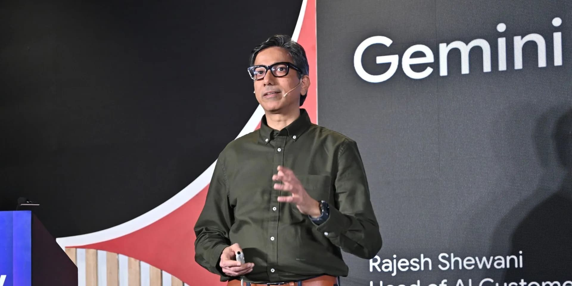 A presentation slide on stage at TechSparks 2026 showing Google Cloud's Gemini AI agent demonstrations