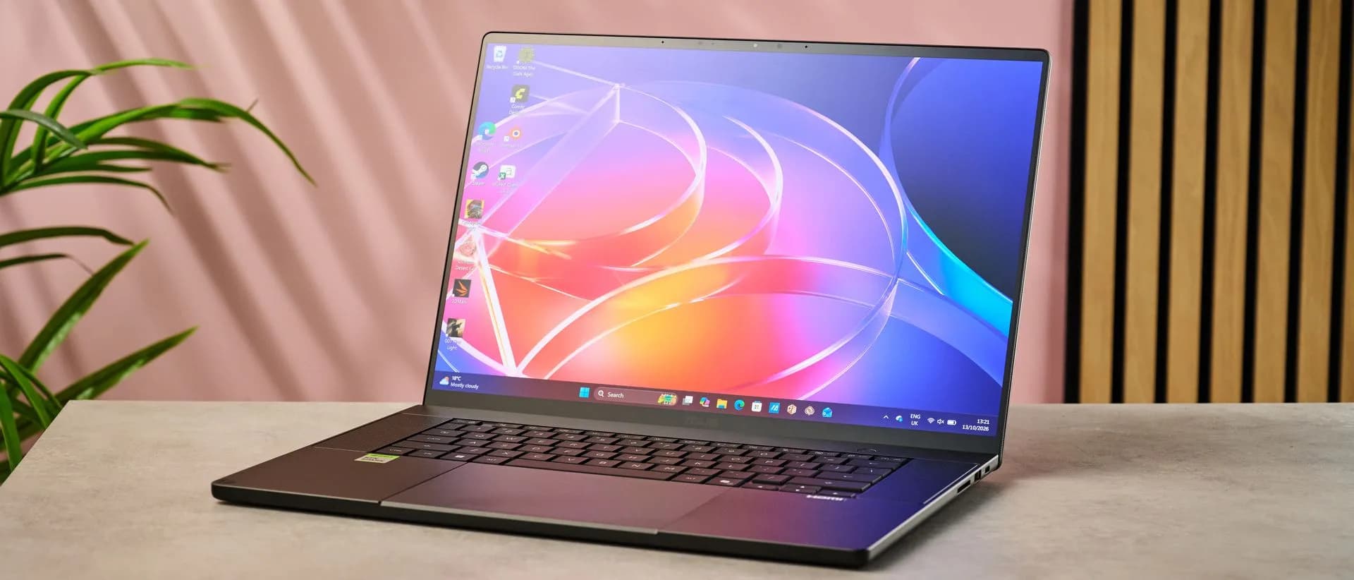 Asus ProArt P16 RTX Spark laptop open on a desk showing its OLED display