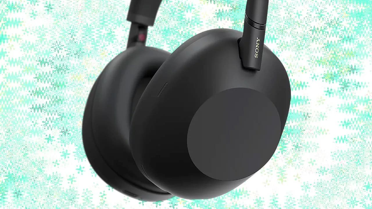 Refurbished Sony WH-1000XM6 wireless noise canceling headphones resting next to their compact carrying case.