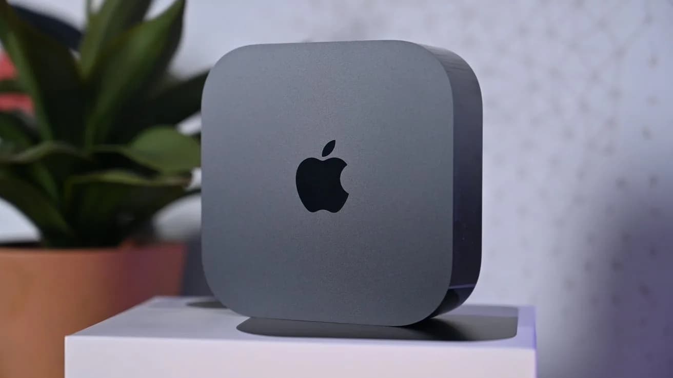 Apple TV 4K remote and device silhouette against dark background