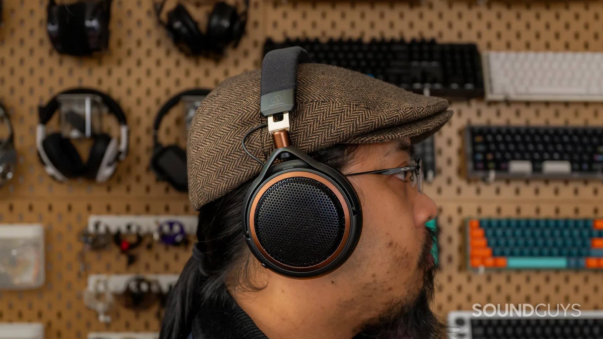 Audio-Technica ATH-AL5NC open-back wireless headphones shown with visible mesh ear cup grilles.