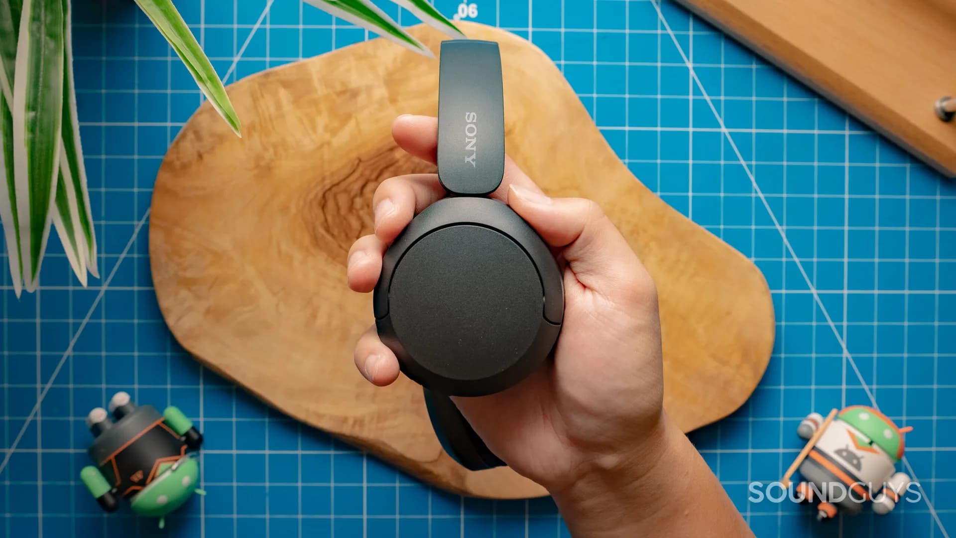 Sony WH-CH520 wireless on-ear headphones sitting on a plain surface