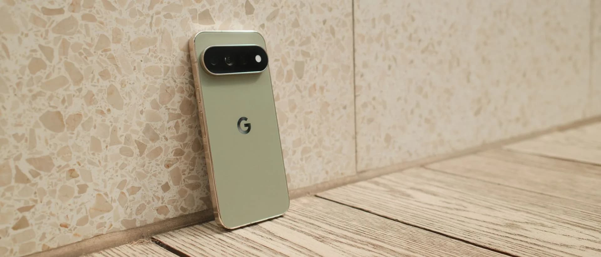 Google Pixel 11 Pro XL in Olive finish, front and back views