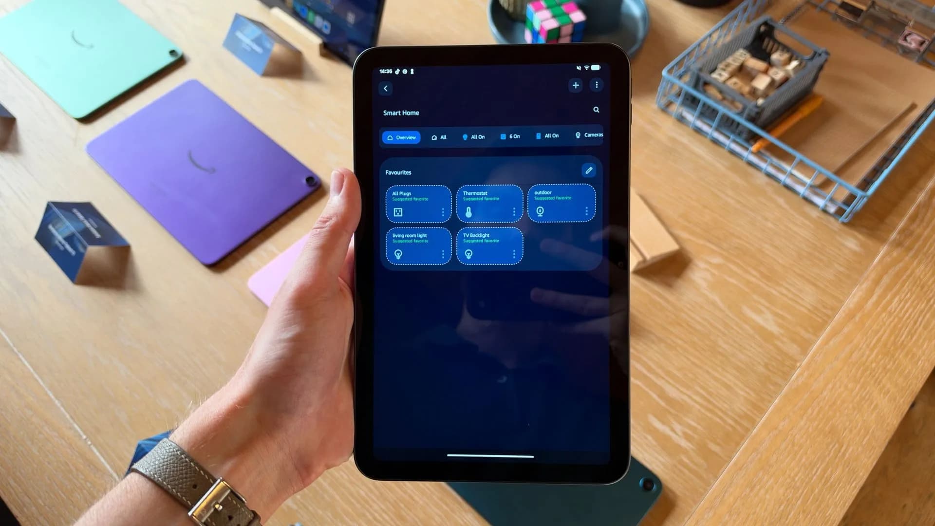 Amazon Alexa Tablet 12 Pro shown resting next to its keyboard attachment and stylus pen