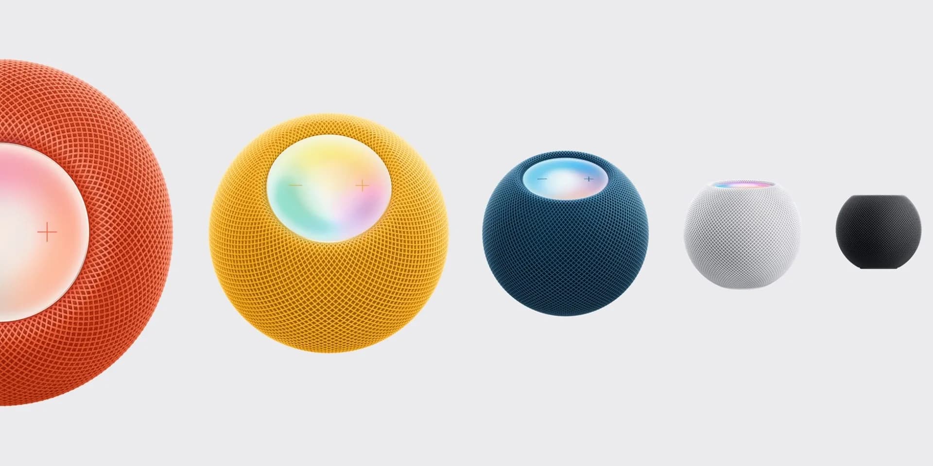 Side-by-side render of HomePod mini 2 (left) and original HomePod mini (right), both in white