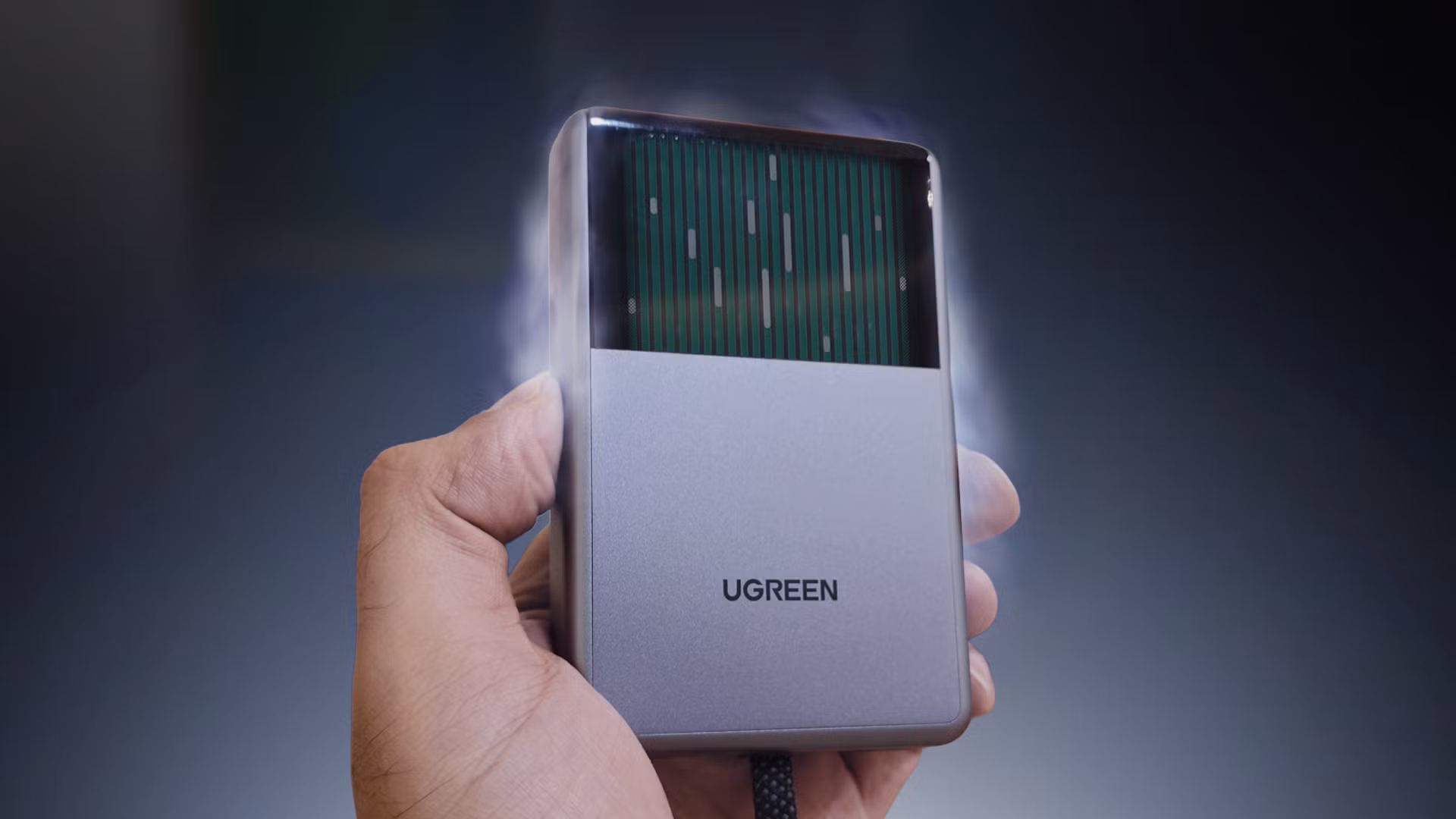 UGREEN MagFlow Pro power bank attached magnetically to a black Google Pixel 11 Pro